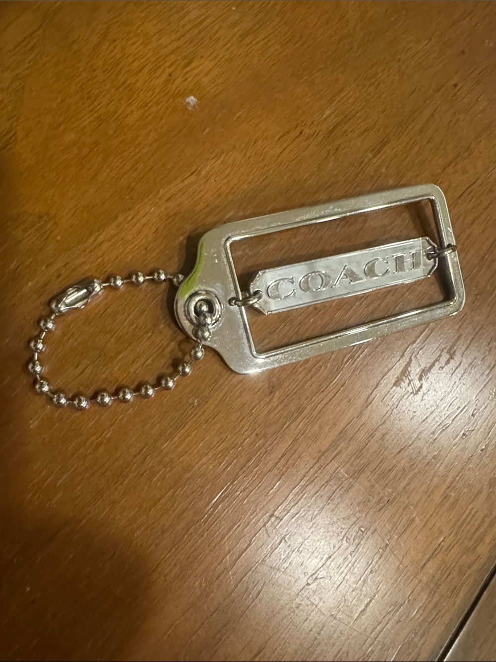 COACH Silver Rectangular Logo Keychain Charm